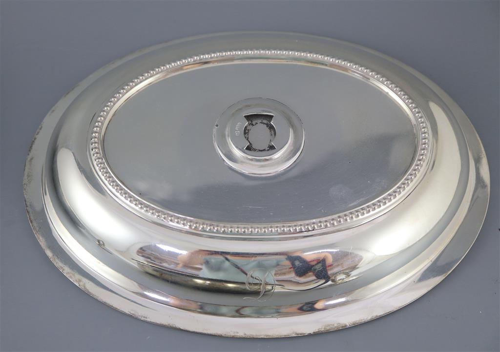 A pair of late Victorian silver oval entree dishes and covers with handles, by Mappin & Webb,